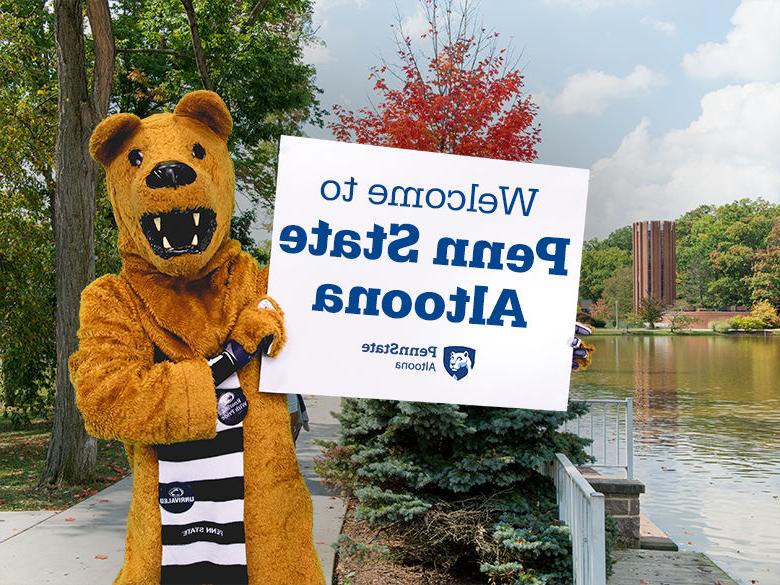 The Nittany Lion mascot holding up a sign reading Welcome to <a href='http://u069zn.ravennahomeowners.net'>十大网投平台信誉排行榜</a>阿尔图纳分校